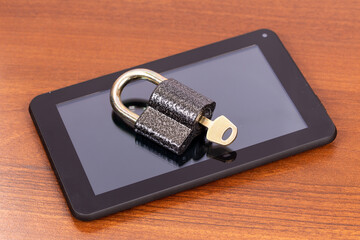 Padlock on a Tablet PC. Data security concept