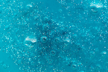 Macro photography of the slime texture.Abstrat blue background with copy space.