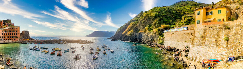 Fototapeta na wymiar Panoramic view of Vernazza fishing village at sunset, seascape in Cinque Terre National Park, Liguria, Italy, La Spezia province:August 16,2021