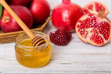 Flat lay composition with symbols jewish Rosh Hashanah holiday attributes on colored background, Rosh hashanah concept. New Year holiday Traditional. Top view with copy space