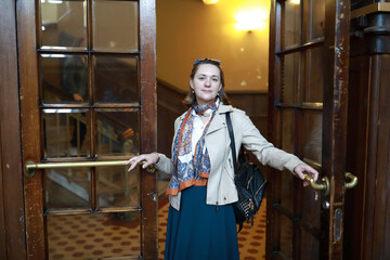 Woman posing in doorway