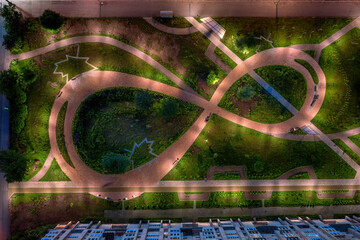 Night paved path road in the courtyard at night top aerial view
