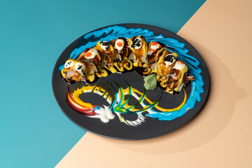 KURO DRAGON served in a plate isolated on background side view of japanese fast food