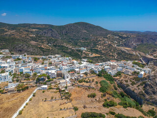 Fototapeta na wymiar Breathtaking aerial panoramic view over Chora, Kythera by the Castle at sunset. Majestic scenery over Kythera island in Greece, Europe