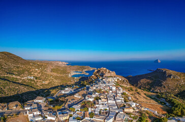 Breathtaking aerial panoramic view over Chora, Kythera by the Castle at sunset. Majestic scenery over Kythera island in Greece, Europe