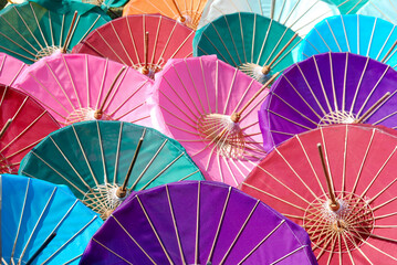 Beautiful and colours umbrellas at souvenir manufacturing side in Thailand