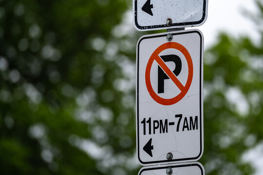 No parking sign with posted overnight hours