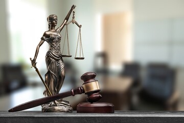 Legal and law concept. Statue of Lady Justice with scales of justice and wooden judge gavel on a...