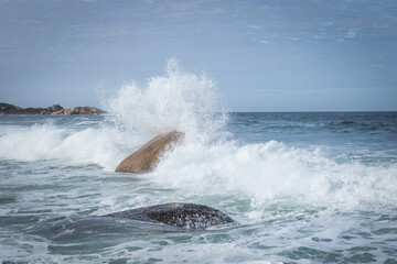 wave breaking on the rocks