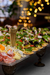 Delicacies and snacks on a buffet or banquet. Catering.	