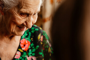 portrait of a beautiful elderly woman photographed in her home where she lives alone