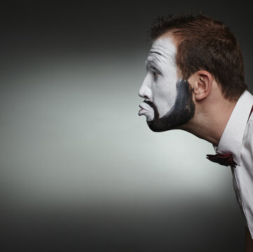 Portrait Of A Cheerful Mime With Different Face Emotions,