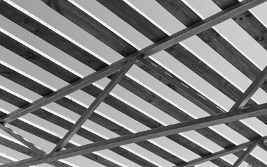 Steel framework with wooden boards, black and white photo
