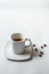 White cup of black coffee isolated on white background with clipping path