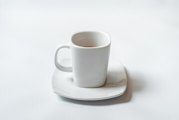 White cup of black coffee isolated on white background with clipping path