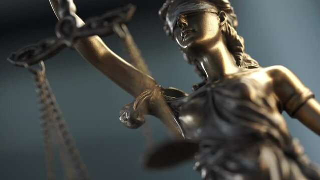 Legal and law concept statue of Lady Justice on gray background