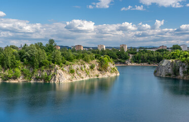 Fototapeta na wymiar Krakow, Poland, Zakrzowek park with picturesque lake in old quarry