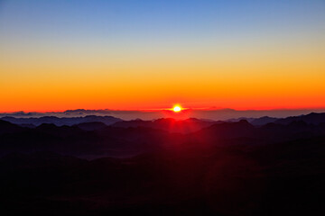 Fototapeta premium Beautiful sunrise on a top of Mount Sinai (Moses Mount) in Egypt