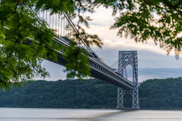 The George Washington Bridge seen from below on the New York City side of the Hudson River. 