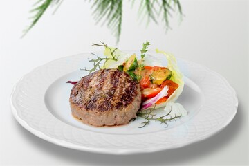Grilled meat with vegetables in modern ceramic plate. Healthy food in minimal style.