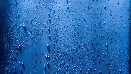 Water drops background. Droplet splash rain texture. Drop splash water pattern. Selective focus.