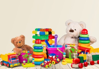 Adorable toddlers many toys at home. A mess in the children's room, a lot of toys in the children's...