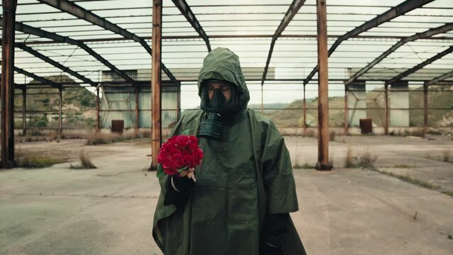 soldier with bouquet of red roses