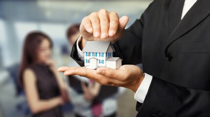 Loan signing concept, refinancing, home and land purchase, rental accommodation, real estate agent or bank employer agreement with a client to Buy a dwelling