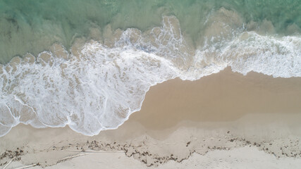 Fototapeta na wymiar aerial view of the sandy beach and ocean in Zanzibar