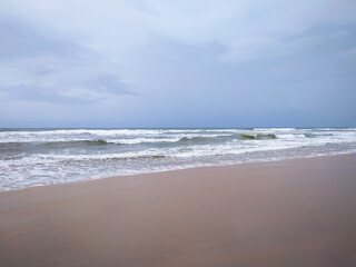 Fototapeta na wymiar Beautiful sand beach and wave background