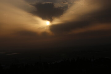 sun rays and clouds
