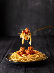 Food photography of meatball, spaghetti, pasta, fork