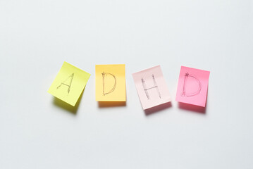 ADHD written on sticky notes.