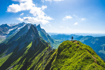 Hiker is reaching a beautiful viewpoint
