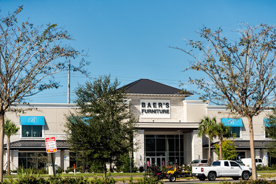 Jacksonville, USA - October 19, 2021: Sign on strip mall building for Baer's furniture brand of designer home furnishings warehouse center store in Florida