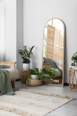 Beautiful room interior with leaning floor mirror