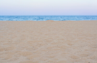 Fototapeta na wymiar Sandy beach near beautiful sea, closeup view