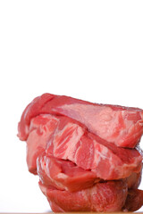 Pork meat.pieces of meat on a wooden cutting board.Cooking meat products.Raw meat on a cutting board. Protein nutrition.
