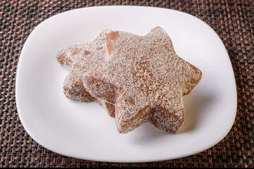 delicious chocolate flavor cookie sprinkled with sugar late night snack placed on a white plate homemade