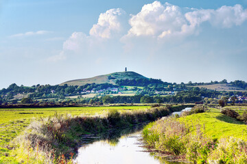 Glastonbury, Somerset, England. Looking northwest over part of the Glastonbury Levels lowland wetlands to Glastonbury Tor © David Matthew Lyons
