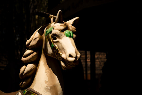 beautiful wooden sculpture of a horse.