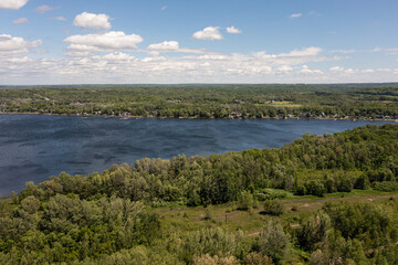 Fototapeta na wymiar Port McNicoll drone panorama shot Northern central Ontario blue skies blue lakes with clouds 
