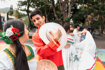 Group of Latin teenagers wearing the classic costume of dances from the north of NIcaragua in a...