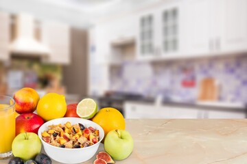 Set of different fruits on kitchen table
