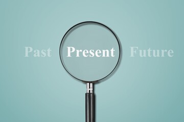 Present wording inside of Magnifier glass on background for focus current situation , positive...