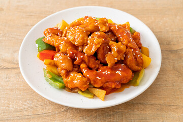 fried crispy chicken with sweet and sour sauce