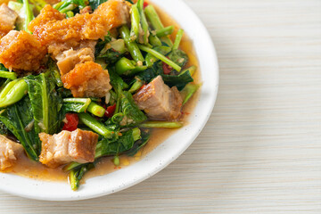 Stir-fried kale vegetable with crispy pork