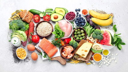 Healthy food assortment on light background. - Powered by Adobe