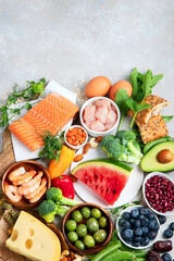 Healthy food assortment on light background.