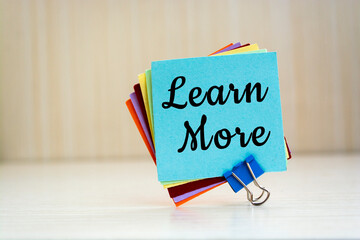 Text sign showing Learn More.
